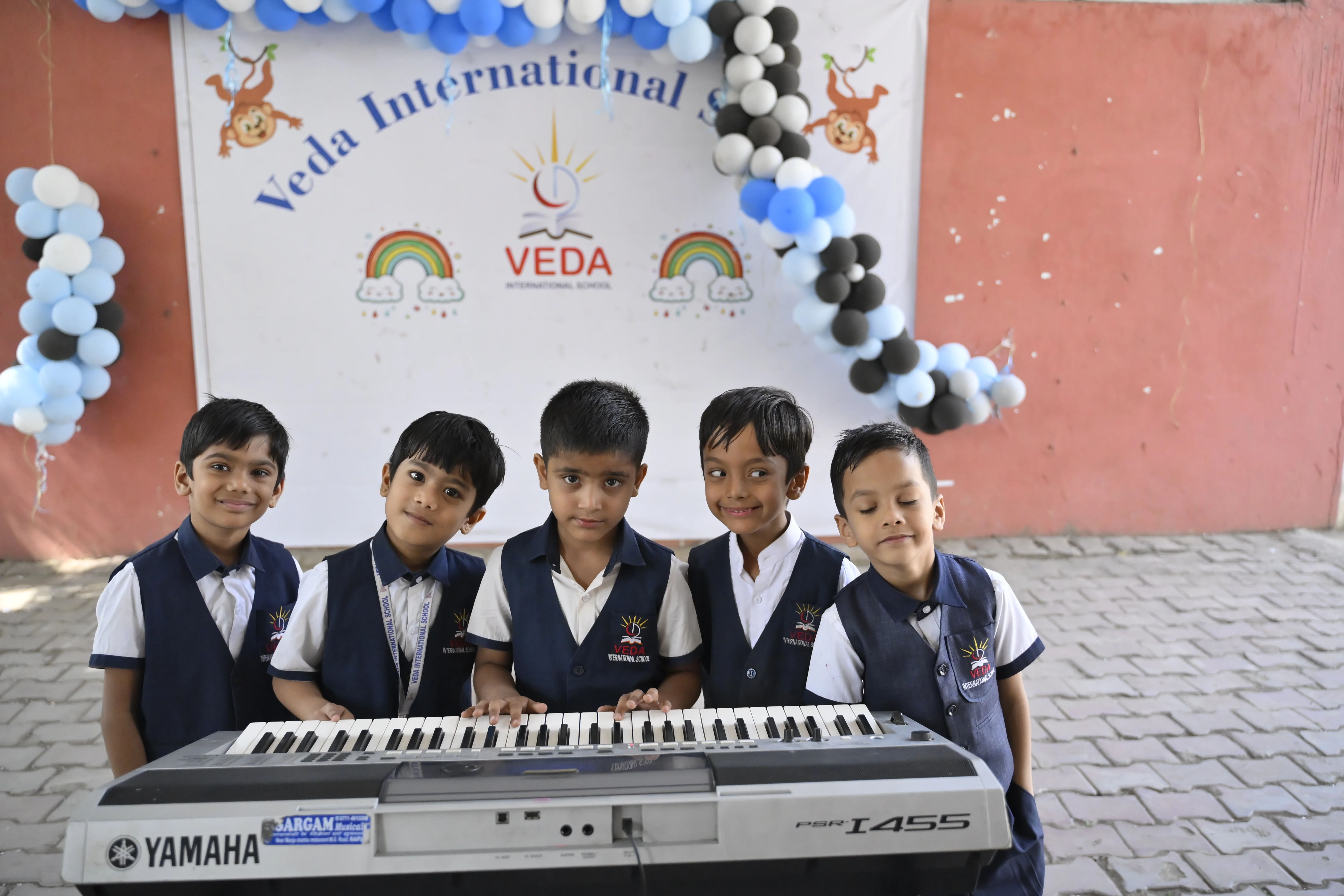 Children learning at Veda International School